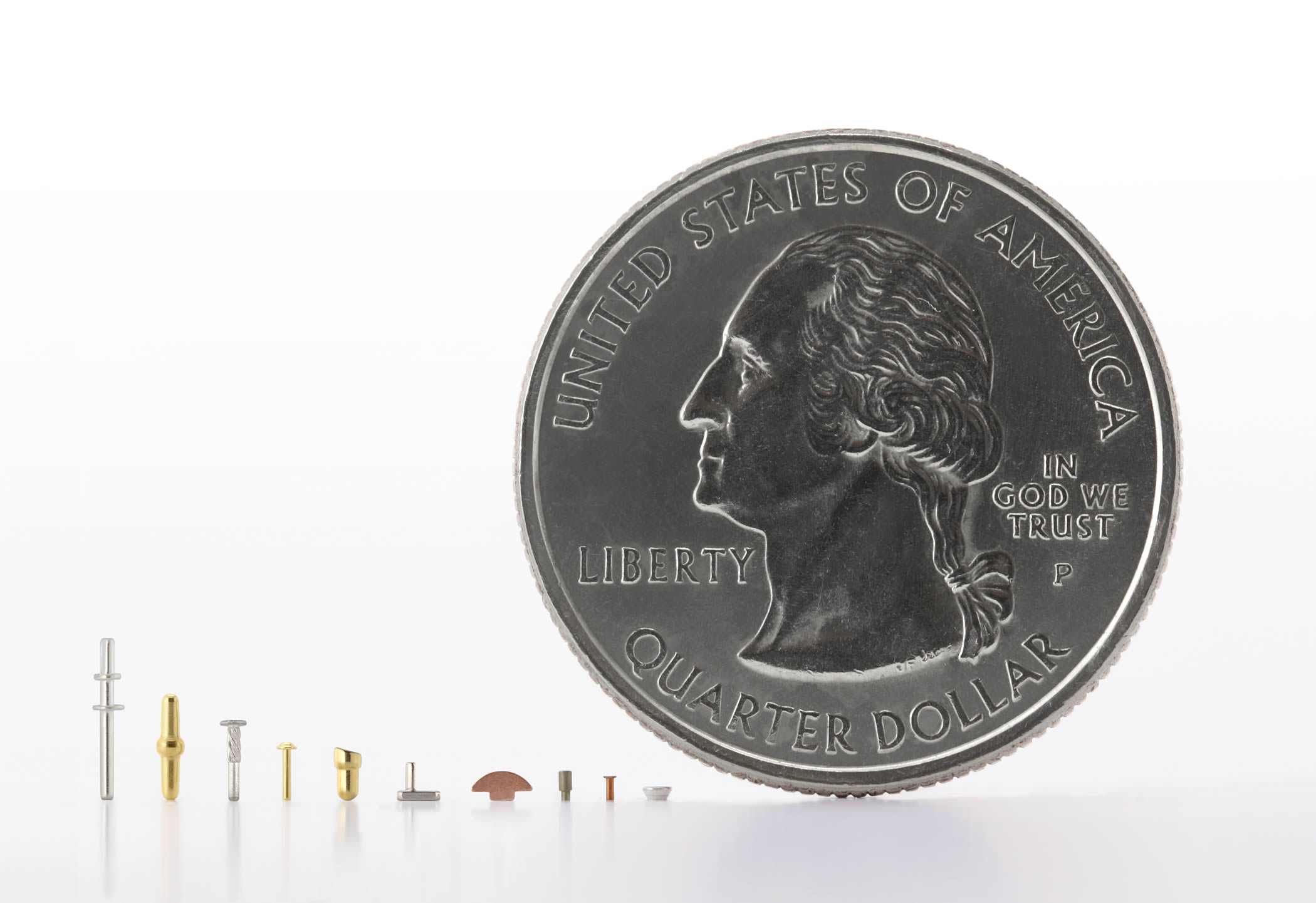 当社の微小製品とアメリカ25セント硬貨との比較